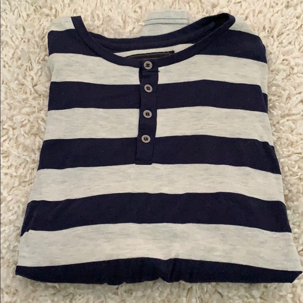 Navy and cream striped long sleeve tee.